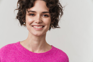 Image closeup of happy attractive woman smiling and looking at camera
