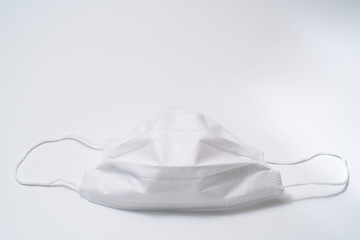 Protective medical mask on white background.