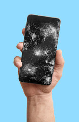 Broken phone in the hand isolate