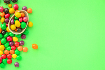 chocolate egg and candy easter decor, menu concept background. top view. copy spaces