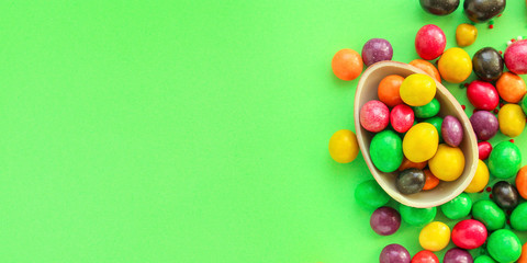 chocolate egg and candy easter decor, menu concept background. top view. copy spaces