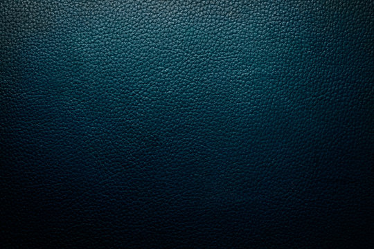 dark blue leather background or texture