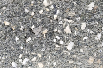 Texture of the outer wall made of cement and stone chips. Construction.