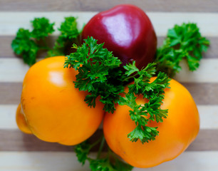 Sweet red pepper, yellow tomatoes and parsley.