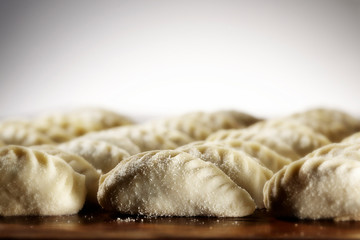 Culurgiones, traditional homemade sardinian ravioli, ready to be cooked