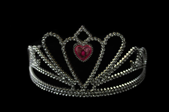 Silver princess crown on the black background