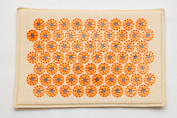 orange acupuncture mat for treatment