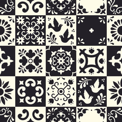 Mexican talavera seamless pattern. Ceramic tiles with flower, leaves and bird ornaments in traditional majolica style from Puebla. Mexico floral mosaic in classic black and white. Folk art design.