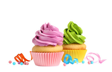 Delicious birthday cupcakes with buttercream on white background
