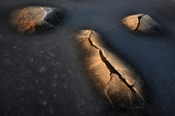 Ice cracks in frozen sea. Näsbokrok, Halland, Sweden.