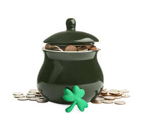 Pot of gold coins and clover on white background. St. Patrick's Day celebration