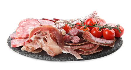 Slices of different sausages with tomatoes isolated on white