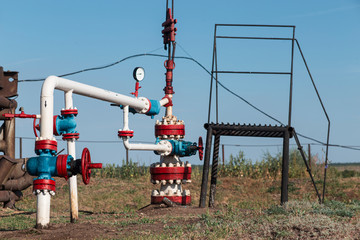 Fototapeta na wymiar valves and pipes in oil production