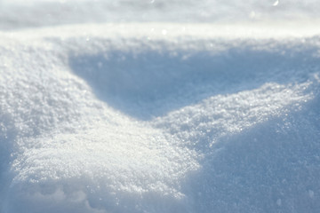 Beautiful snowdrift as background, closeup view. Winter weather