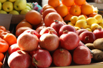Fresh ripe fruits on counter at wholesale market