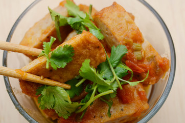 fried eating fishcakes (cha ca) top view