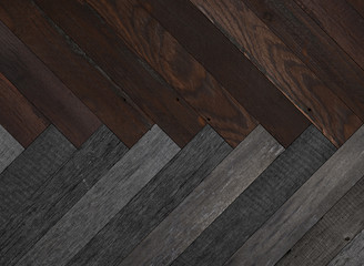 Old dark wood texture background. Wooden floor with herringbone pattern made of barn boards