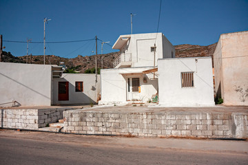 Fototapeta na wymiar View of some modest Greek houses in the interior of the island of Crete.