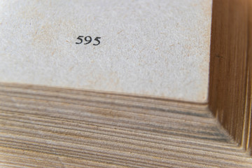 Macro image of yellow images of old, big book