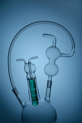 Chemical dishes on a gray background. Equipment of laboratories. Chemical concept.