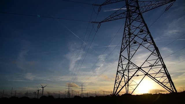Electricity pylons in the Sardinian countryside at sunse
