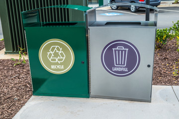 Recycle and landfill garbage cans together