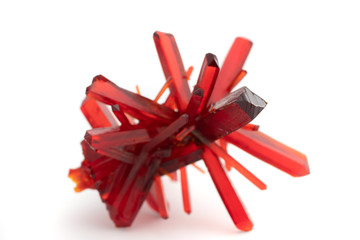 Red crystal of natural origin. Natural geological material for use in technology and jewelry