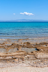 Panoramic view of beach of town of Afytos, Kassandra, Chalkidiki, Central Macedonia, Greece. Beach on the Ionian Sea