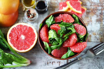 Healthy fitness salad with spinach and grapefruit. Diet concept.