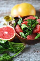 Healthy fitness salad with spinach and grapefruit. Diet concept.