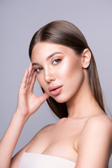 Beautiful model girl with perfect healthy skin and hair