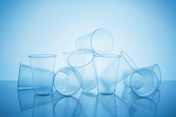 heap of empty disposable plastic cups