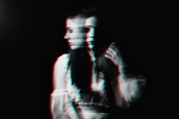 abstract portrait of a girl with mental disorders and schizophrenic diseases with blur - obrazy, fototapety, plakaty