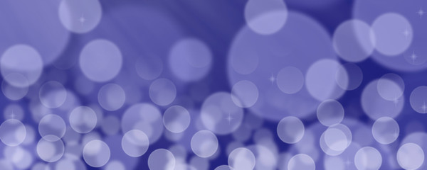 Abstract blue bokeh banner background - birthday, father's day, valentine's day panorama - blurry bokeh circles on a blue background with sunbeams