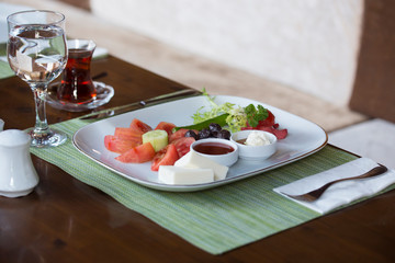 tea and beautiful breakfast plate
