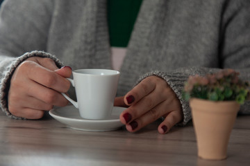  woman hand cup of coffee