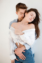 Hugging loving boy and girl outside