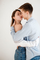 Hugging loving boy and girl outside