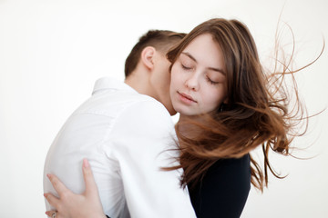 Hugging loving boy and girl outside