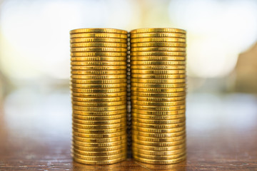 Business, Money, Finance, Security and Saving Concept. Close up of two stack of gold coins on...