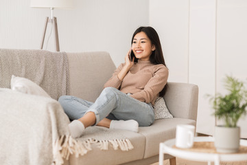 Call from friend. Excited girl talking on phone