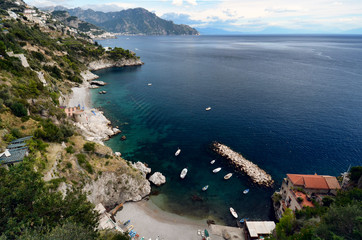 Obraz premium Panorama of the coast towards Amalfi.. Marina di Conca is a small bay surrounded by numerous white houses and represents the main bathing establishment of the village. Amalfi coast, Italy