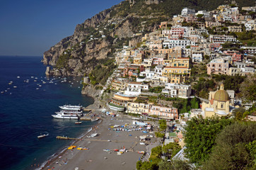Positano. View from above of the large beach and the village that climbs the hill