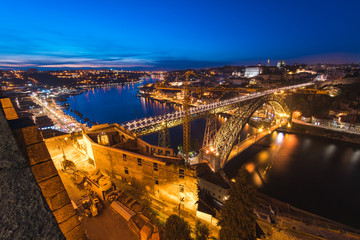 Night View of Arched Luis I Bridge Carrying Low Level Road and a High Level Metro Line Between...