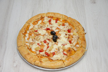 Hawaiian Pizza isolated on a white background 