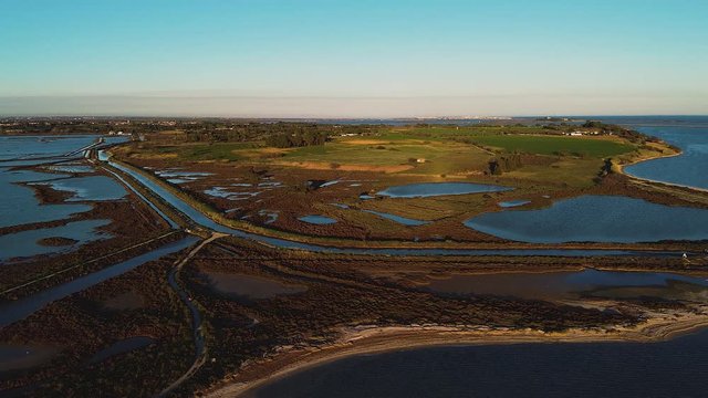 Aerial images of the litlle ponds with the sunset light in l'&eacute;tang de Vic, Vic la Gardiole, Languedoc-Roussillon, France, Europe.