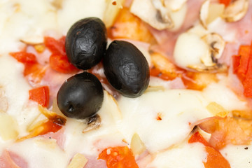 pizza with peppers and mushrooms, sesame and olives