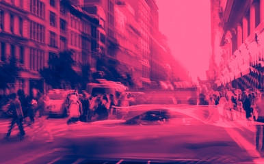 New York City blurred abstract street scene with people and taxis in Midtown Manhattan in pink and blue