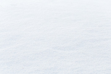Texture of natural snow. Top view of the snow.