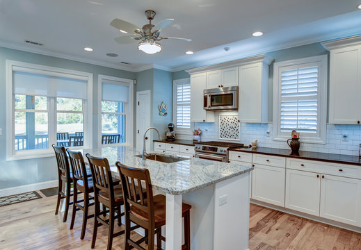 Beautiful luxury kitchen with quarz countertops and view windows